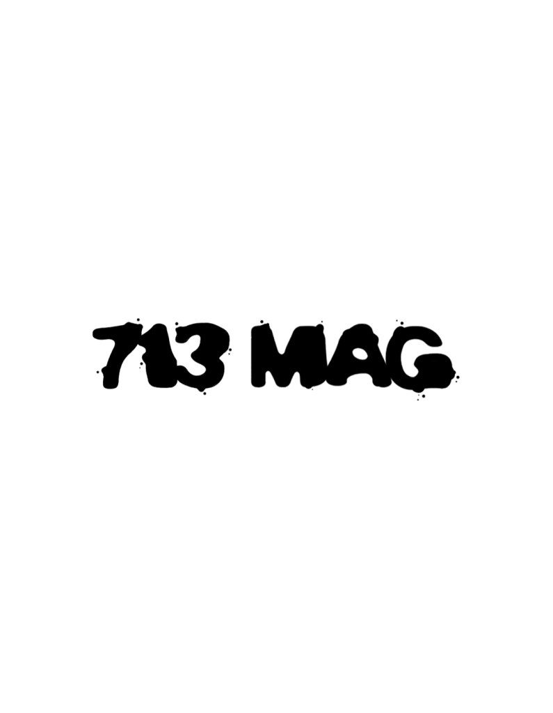Black stylized text reading '713 MAG' on a white background.